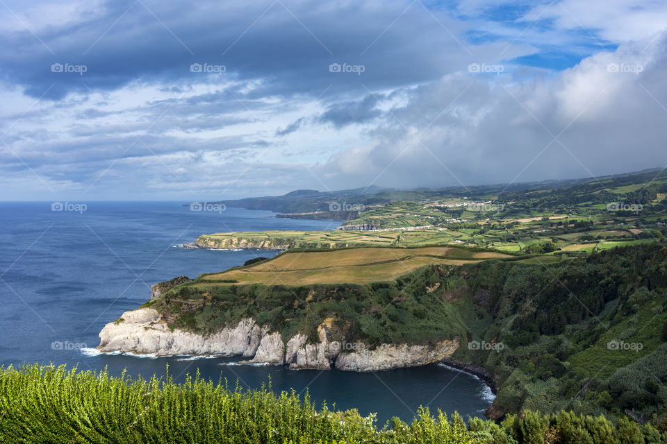 A panoramic view from the Miradouro of Santa Iris on the coast of the island of Sao Miguel, Azores, Portugal.