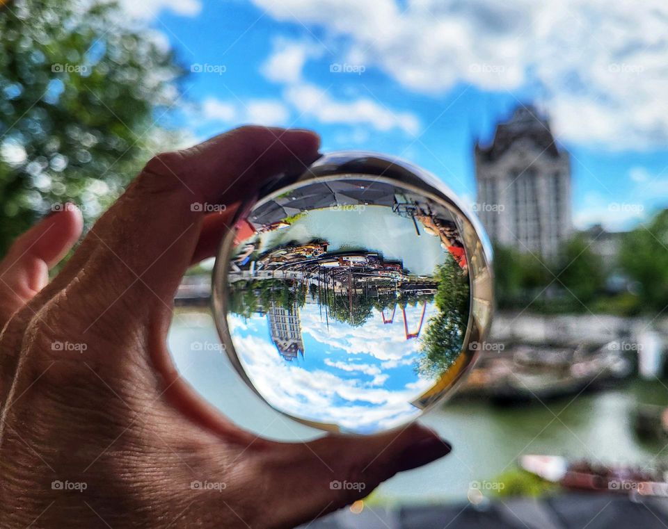 The old harbor, the bridge and once the highest building of Europa in one picture.Thanx to the crystal ball to make this picture of my birth city Rotterdam