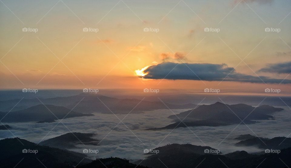 foggy morning in himalayas, nagarkot, nepal