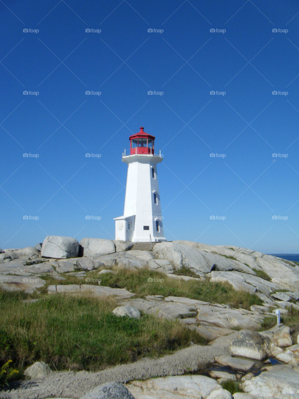 ocean canada lighthouse scenic by dixieyankee