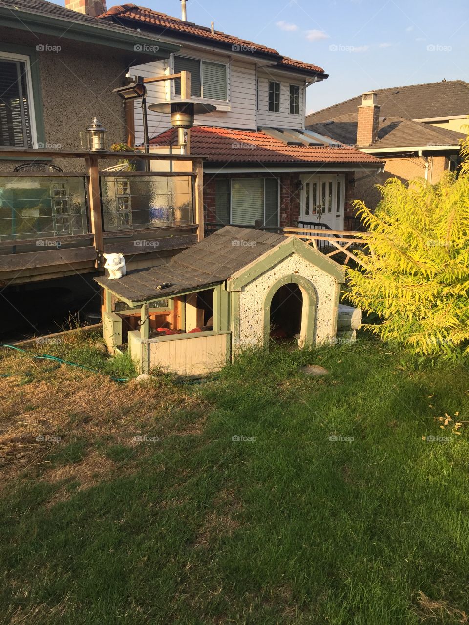 An architect’s dog house, built to look like it’s owners residence to make the dog feel more at home.