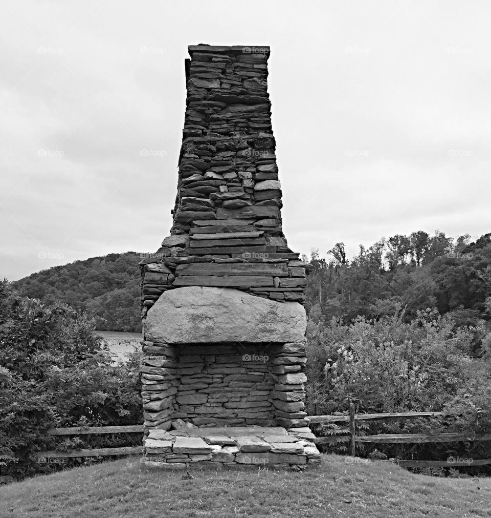 Old chimney by a river