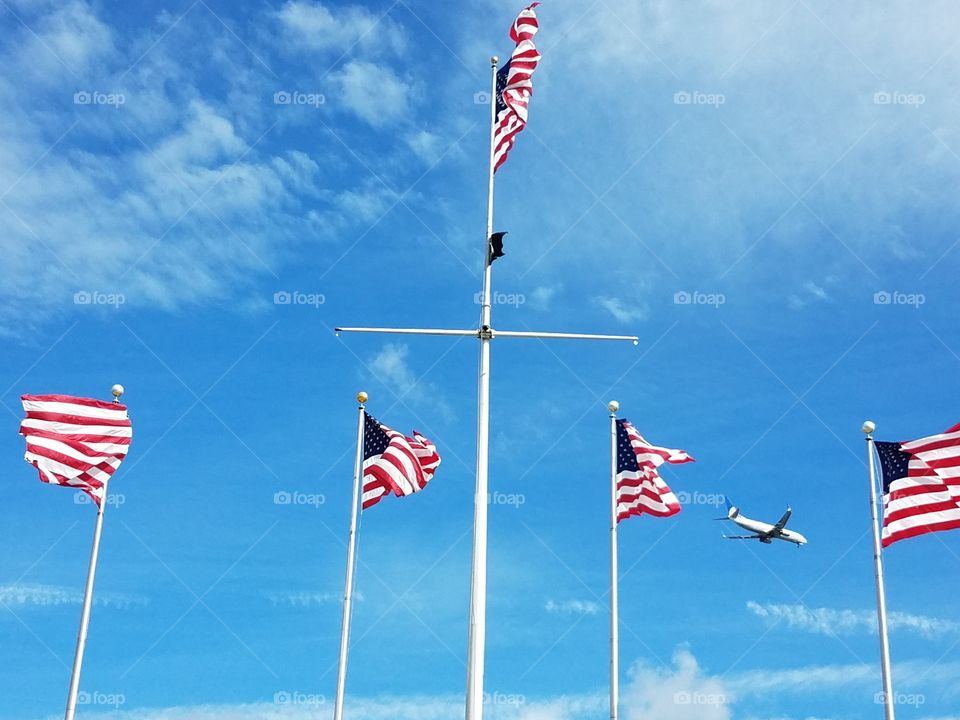 Flag poles fly at Elizabeth,  nj waterfront