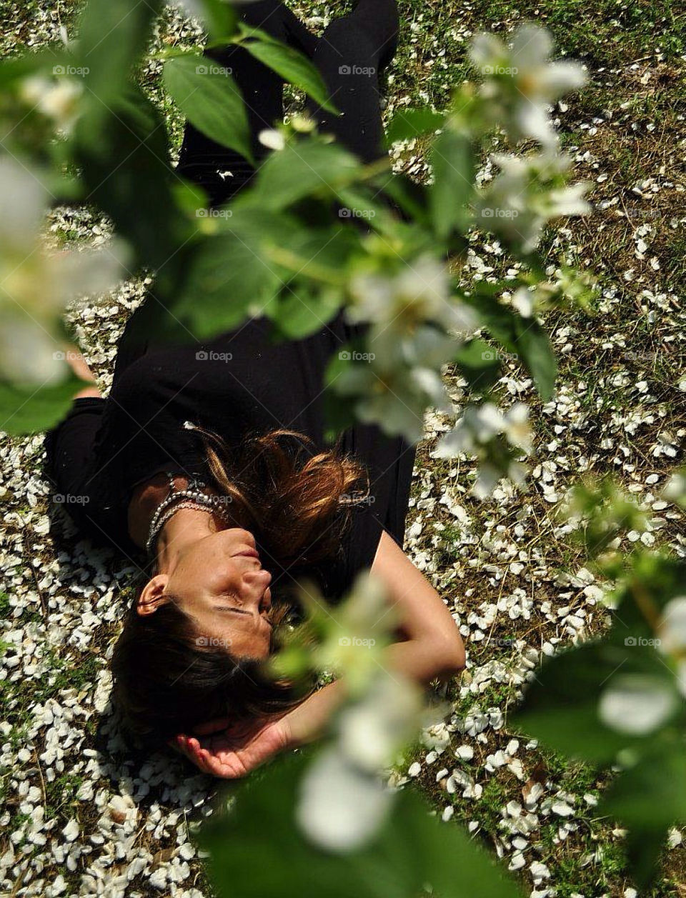 Laying under tree