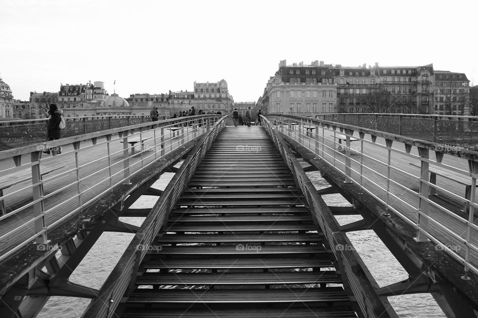 Bridge with wooden stairs. Symmetric bridge 