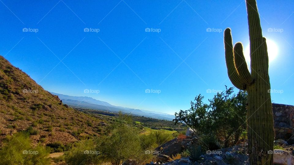 Desert valley surrounded by the mountains and hills of beautiful Arizona.