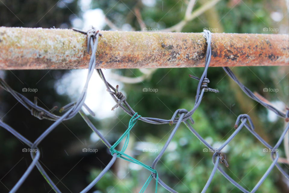 winter fence metal rust by twilite