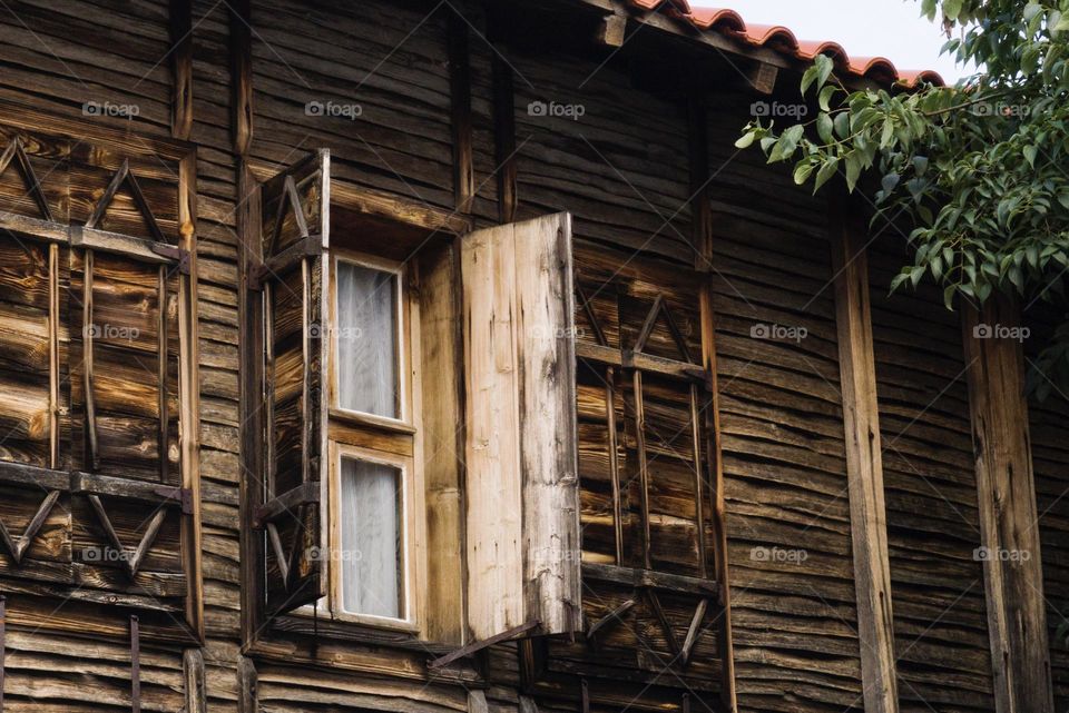 Old wooden house, rectangle wooden window 