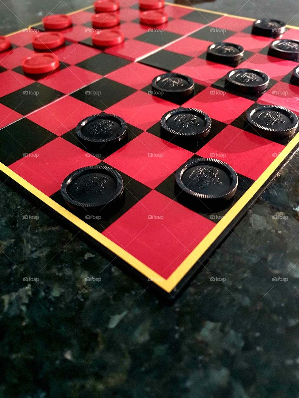 rectangle- checkers game in the colours black and red