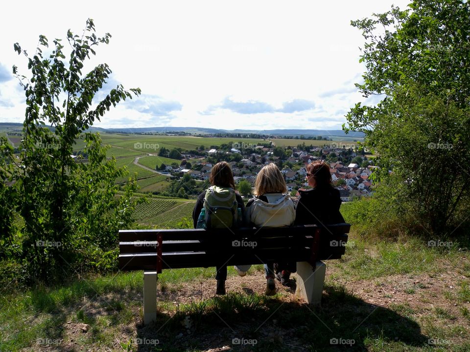 three girls on a bench