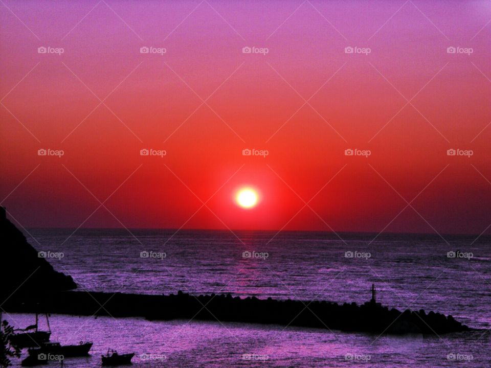 Sunset over the port of Palinuro ( Italy ).