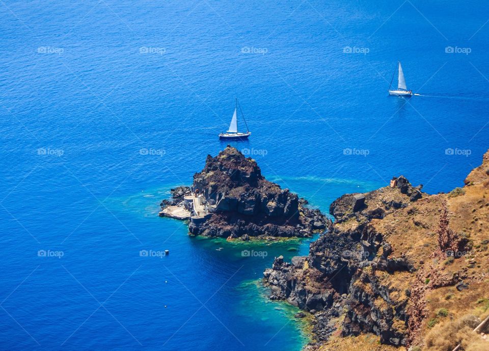 Beautiful side of Santirini. Beautiful side of Santorini in deep blue Mediterranean sea, Greece.
