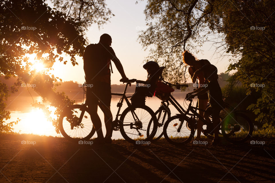 action, active, activity, adult, bike, biking, boy, caucasian, child,childhood, close, cycling, family, fit, garden, group, happy, health,healthy, lake, landscape, lifestyle, nature, outside, path, people,recreation, recreational, rest, silhouette, sport, summer, sundown,team, together, tree, vitality, weekend, young