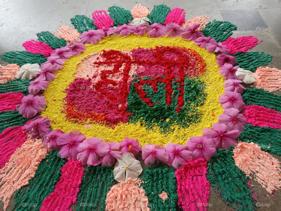 A platter of color with radiant, striking contrast and still making a beautiful outcome is showcasing how people of difference in many aspects still make the world beautiful as whole. Red and green and yellow and purple flower. Unity is Power.