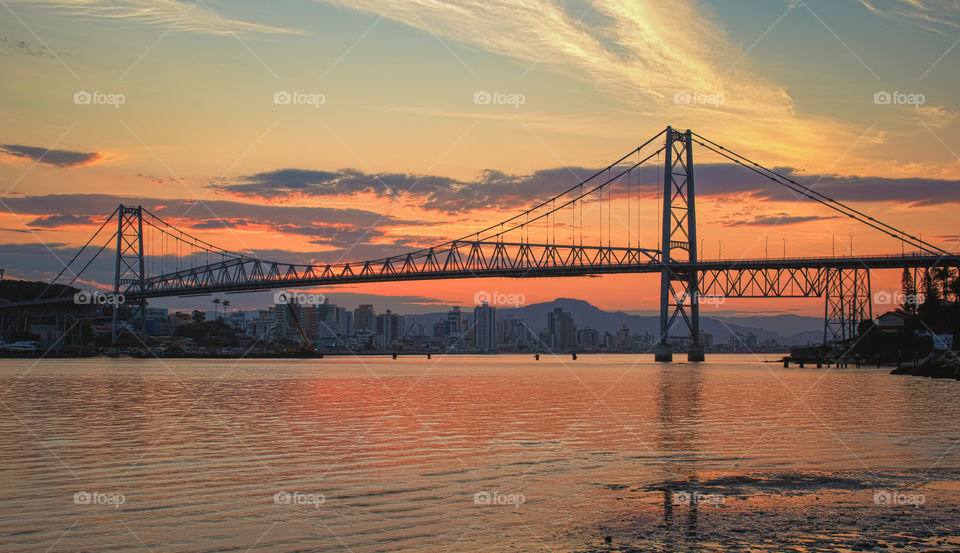 Hercílio Luz Bridge in Florianópolis - Santa Catarina - Brazil, with sunset in the background.