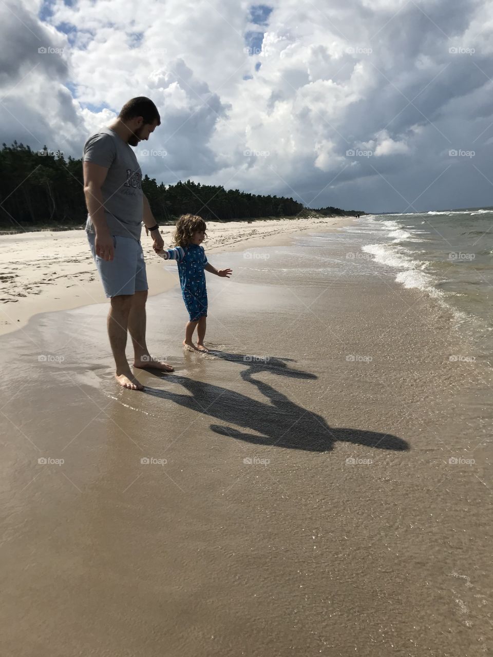 Father and son on the beach ⛱