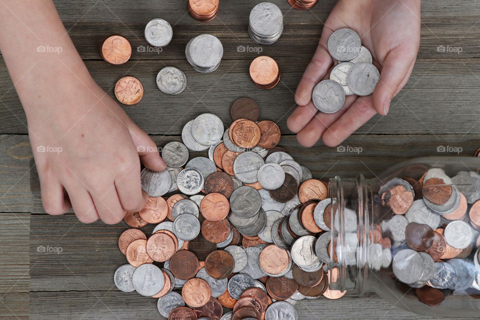 Child counting her coins