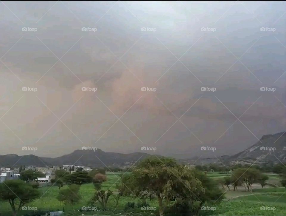 Glory be to God, the magnificent and picturesque view and the natural green trees are a view that is nothing more wonderful than it