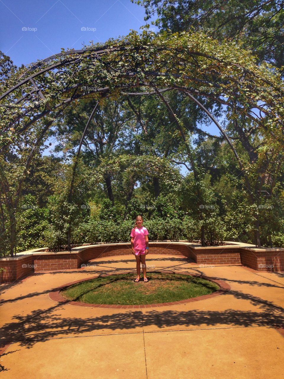 Nature dome. Girl in a dime covered in plants