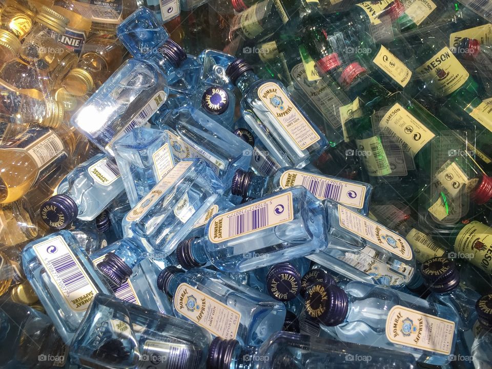 small Gin bottles in a duty free shop at Copenhagen Airport.