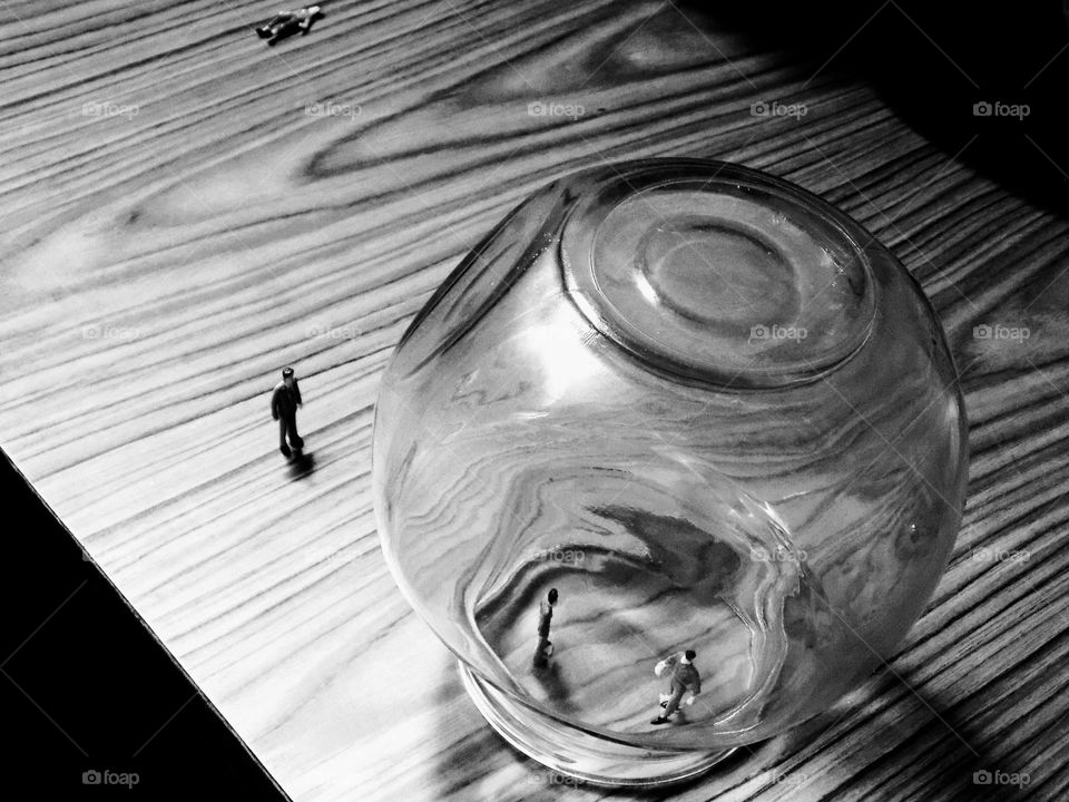 From the world of liliput, trapped in a glass jar, mister giant