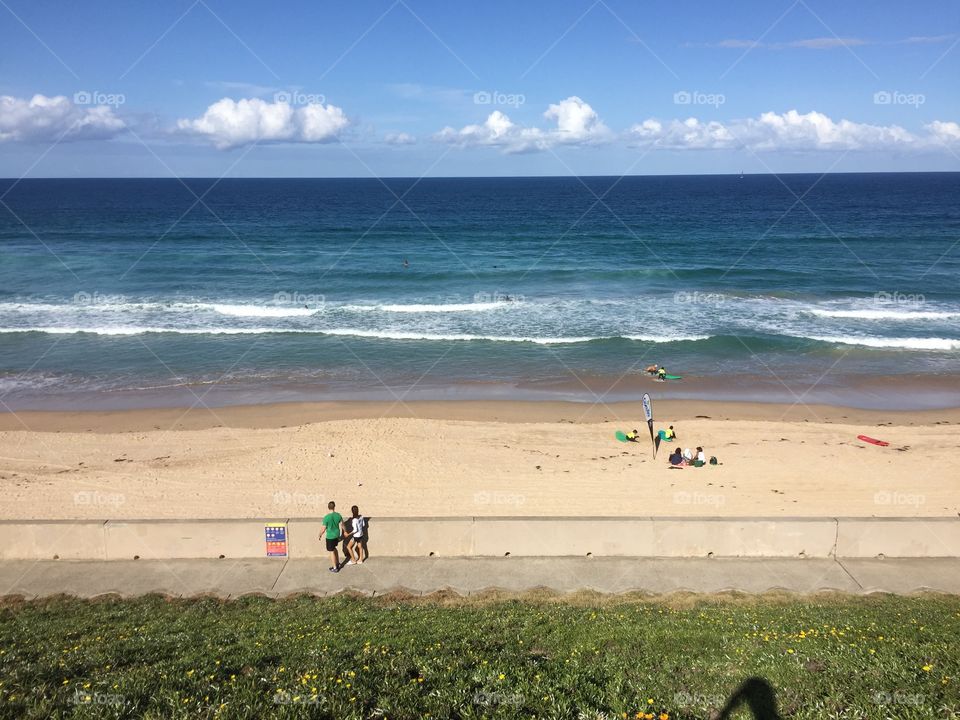 Nice still HD picture shot of the beach with sand and the ocean 