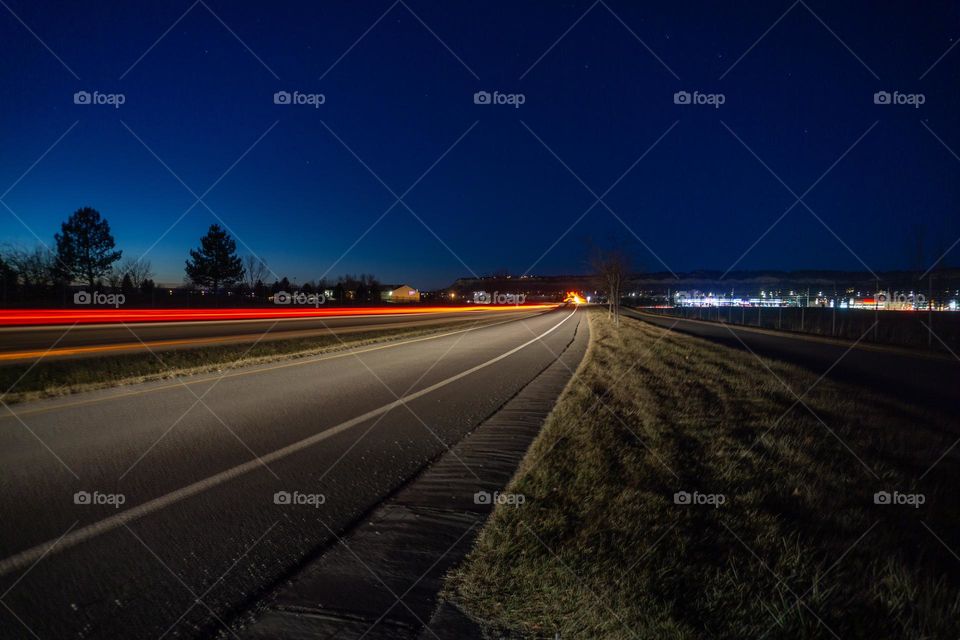 Long exposures street and few passing by.