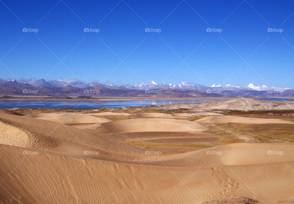 Snow dunes and lakes in Tibet 