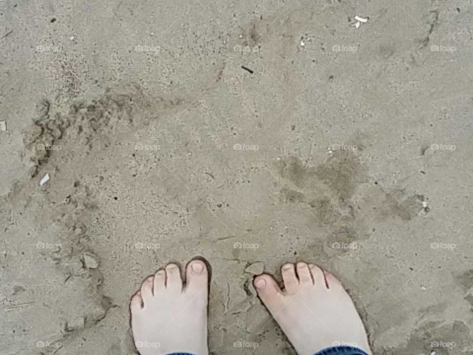 Toes in the Sand. at the beach of Cedar Point. The sand feels amazing.