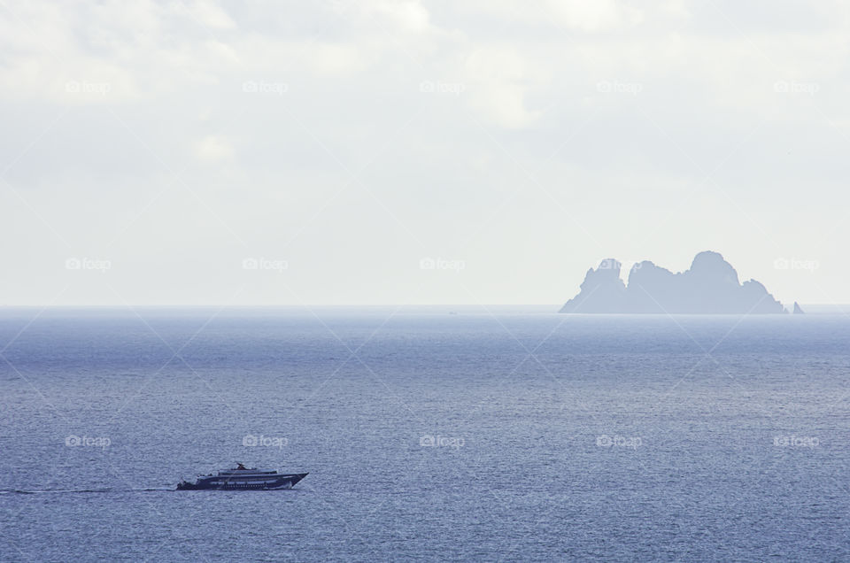 Ferries transport passengers In the sea and Koh Ngam at Chumphon in Thailand.