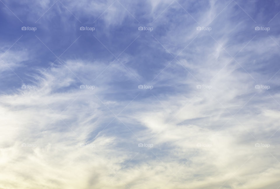 The beauty of the sky with clouds and the sun.