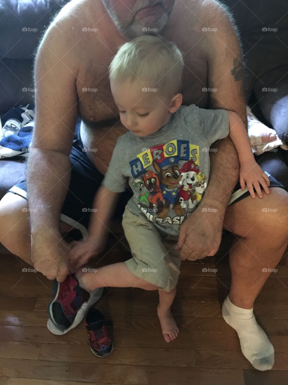 Papaw helping get his grandson ready