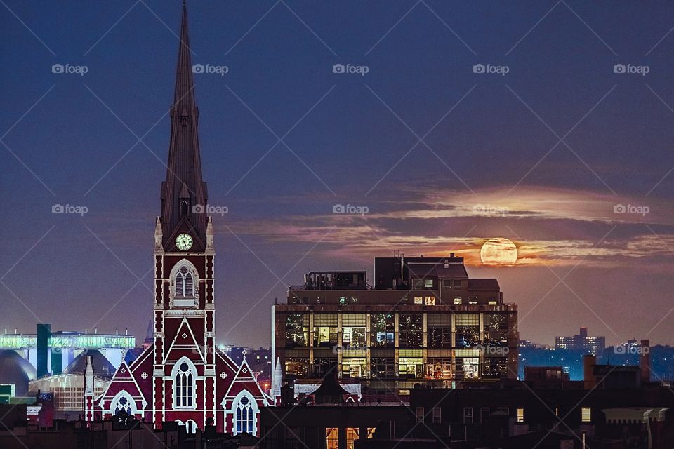 Church under the 2016 super moon near dusk in Brooklyn, New York.