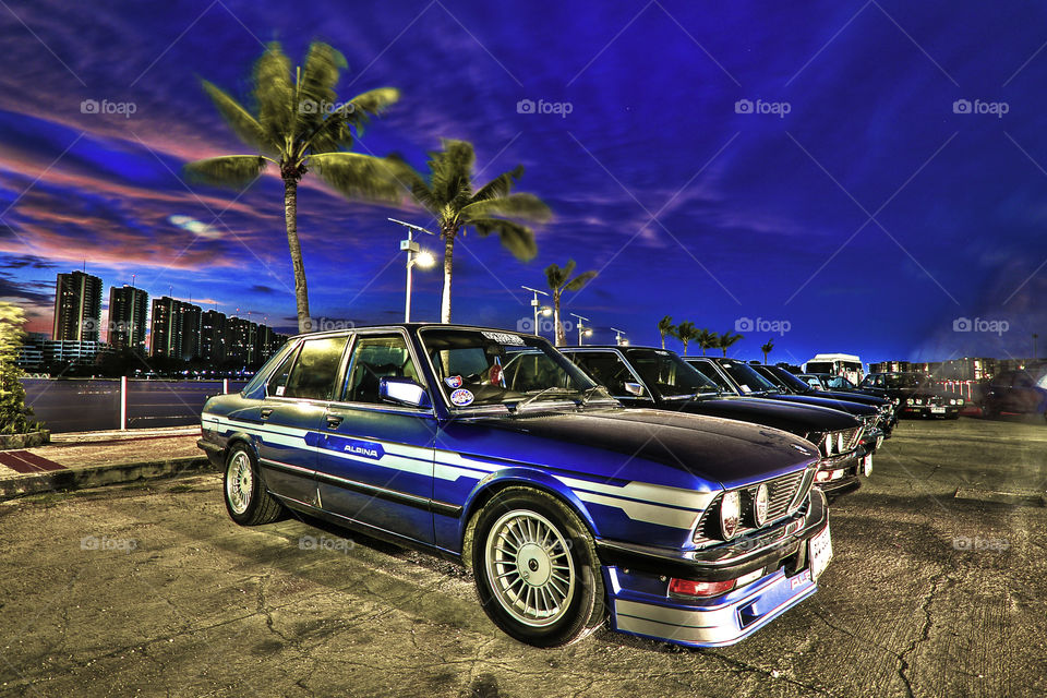 retro vintage classic BMW cars during sunset
