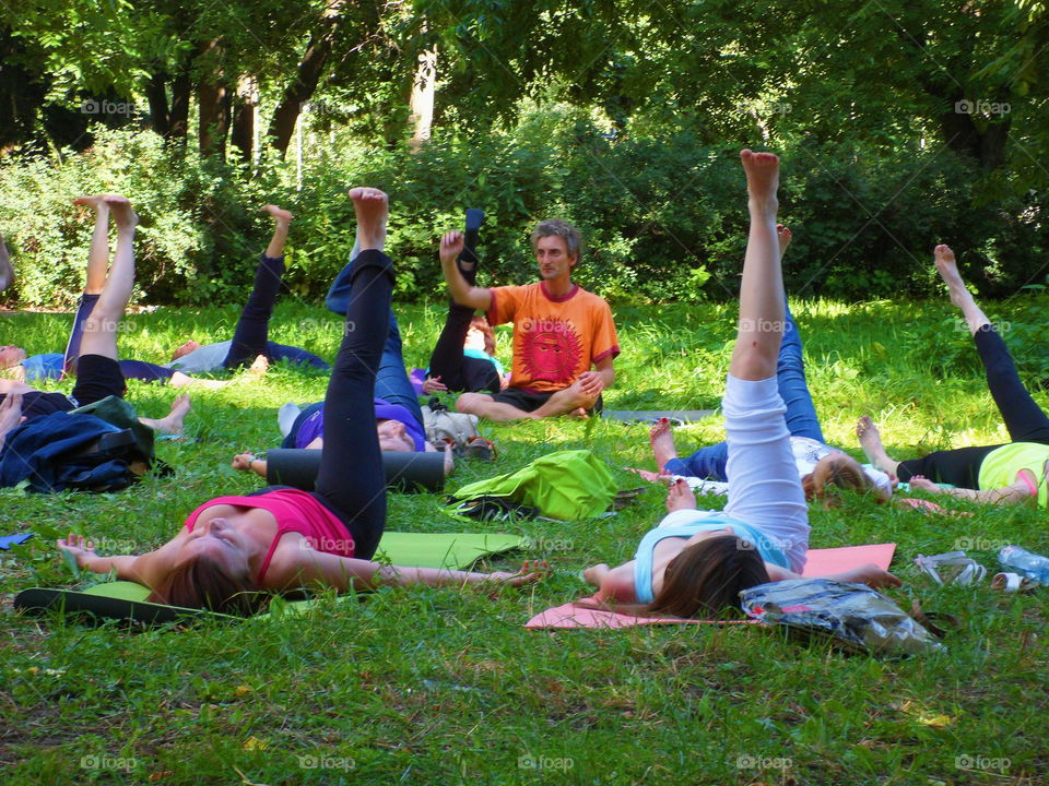group of people doing yoga outdoors, Ukraine, Kiev