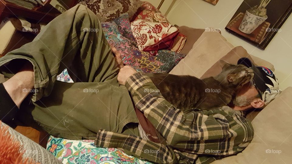 Relaxing with his kitty