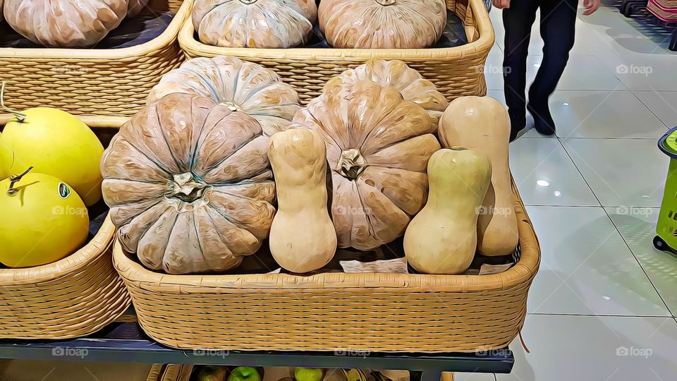 pumpkin fruit in basket, ready for sale, fresh frui, rich in vitamins, rich in water and other minerals, woven wooden basket motif, made of plastic, factory made, vitamin pumpkin, vitamin A B C E calcium, vitmain A pumpkin, vitamin E pumpkin, calcium