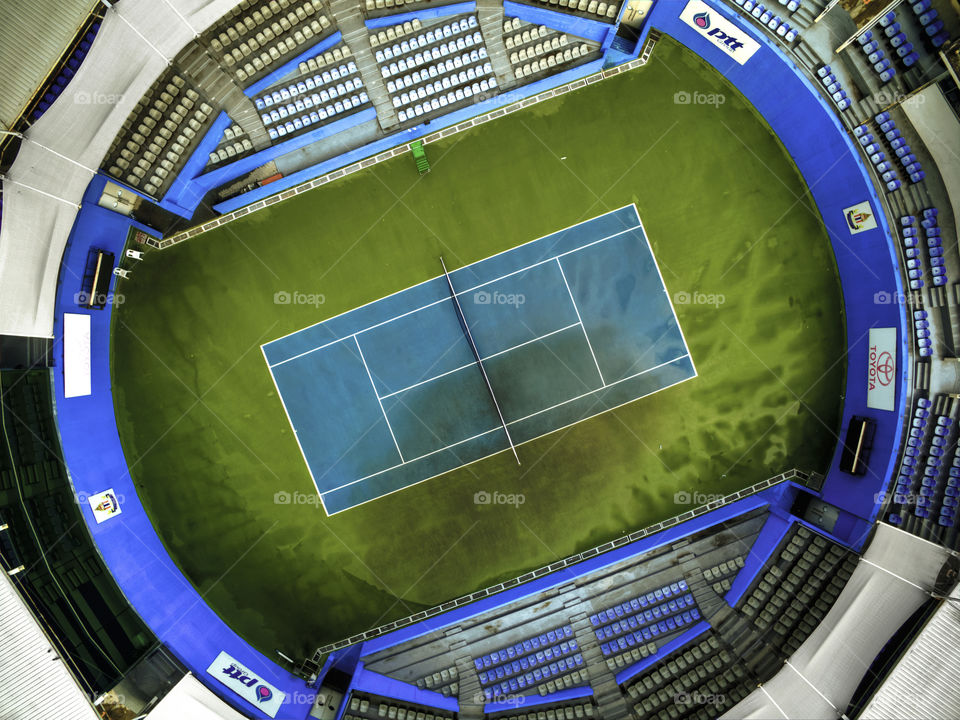 high angle view above tennis courts from drone