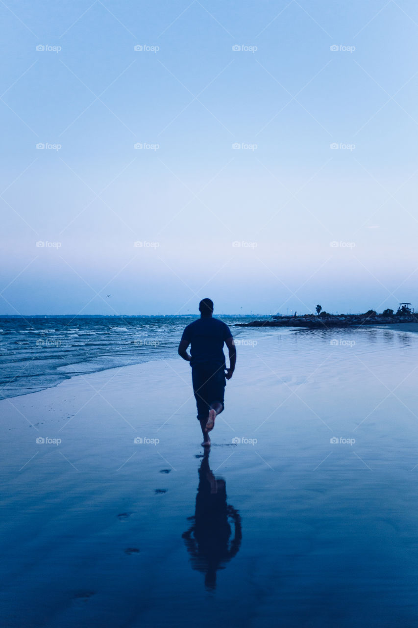 Beach time with my partner and photographing him run is one of my fond memories of summer