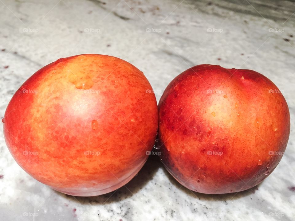 Nectarines on granite counter