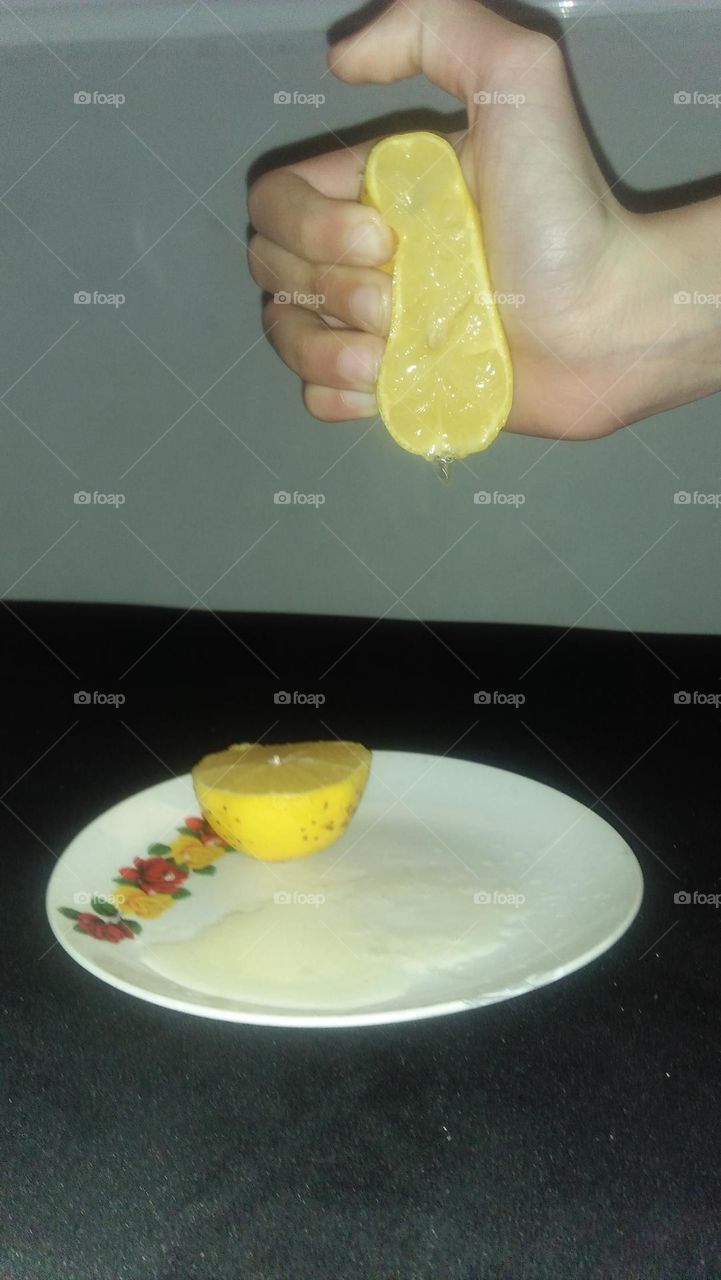 Little Hand Squeezing Lemon