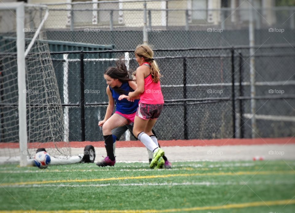 Girls Playing Soccer. Young Girls Playing Soccer
