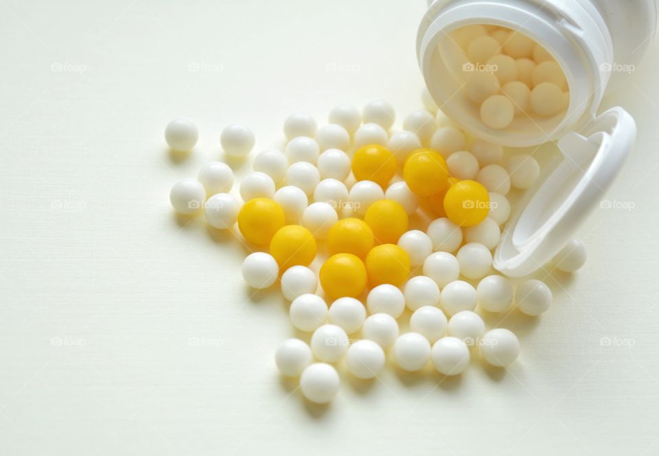 round vitamins and jar medical on a white background, beautiful texture