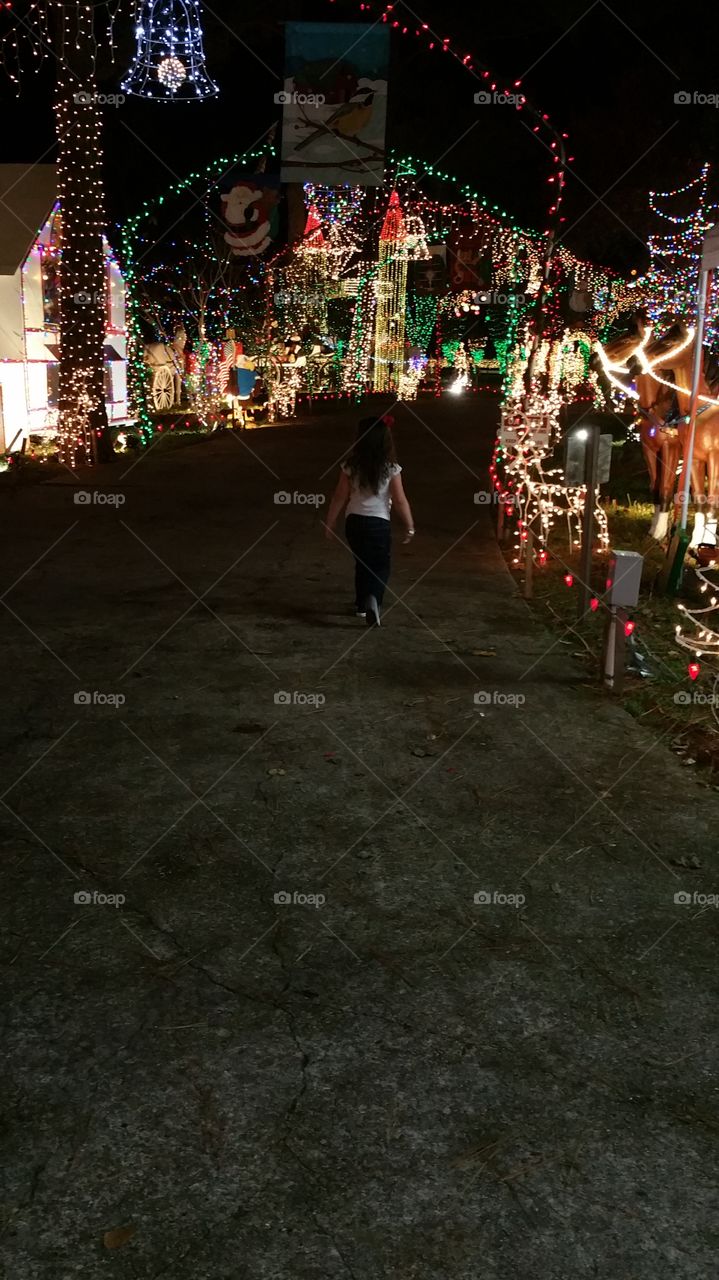 Child enjoying Christmas Lights