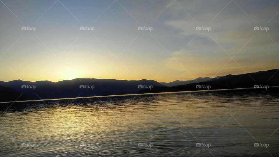 Golden Summer Sunset on Lake Chelan, Chelan, Washington, USA

Instagram username; anita.walter.796