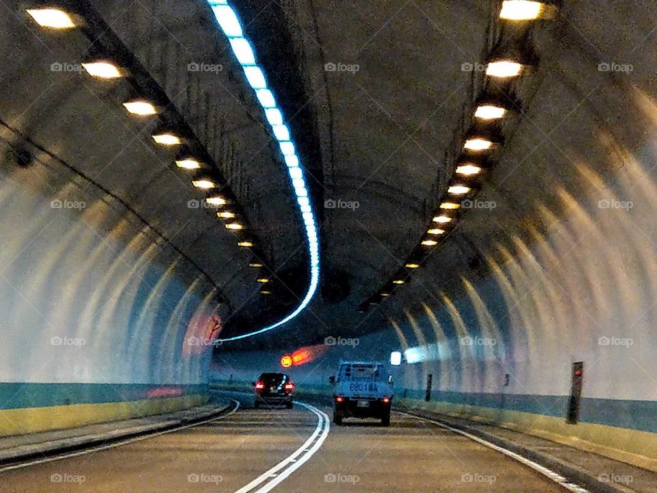 Best of the best: there are smooth lines(lights, road, wall lines) to the end of semicircle tunnel that has a visual beauty.