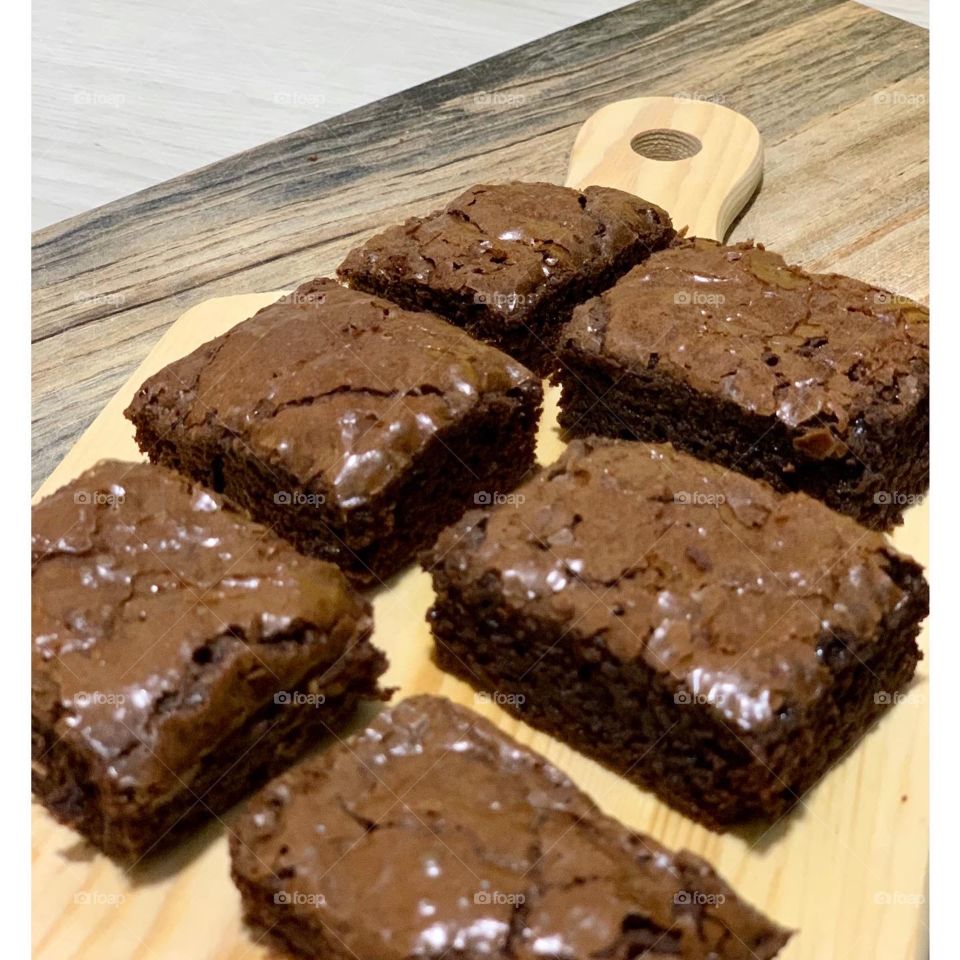 Freshly baked brownies that are rich and fudgy 