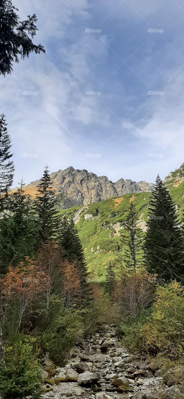 Beautiful trail in the Tatra mountains and waterfall