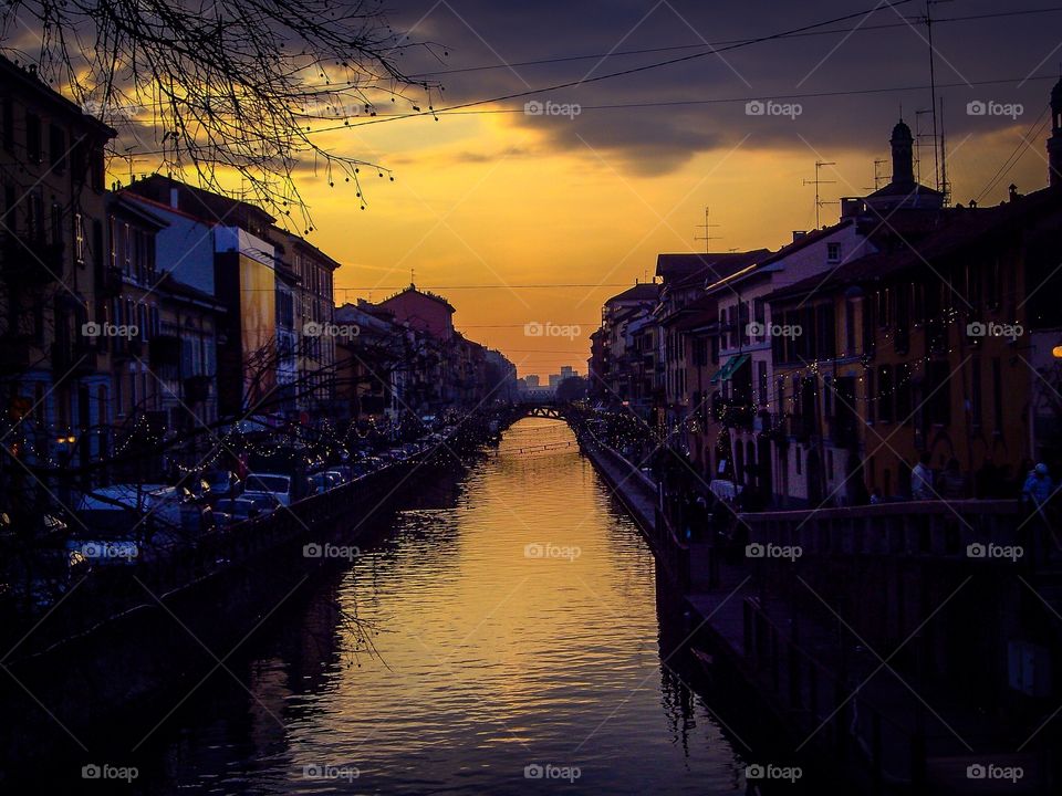 Canal waterfront in Navigli district at dusk