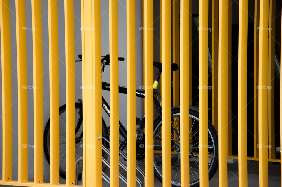 yellow railings and bike